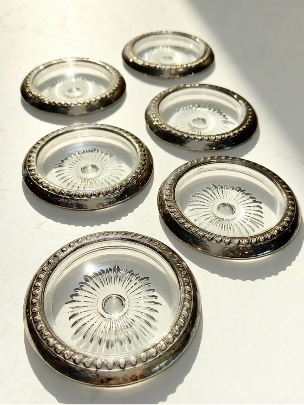 6 Sterling silver rimmed coasters